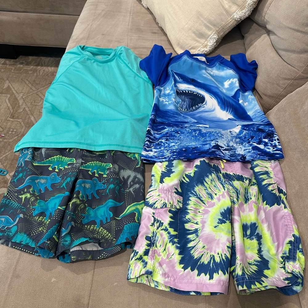 Blue and Green Swim Trunks with Ocean-Inspired Patterns